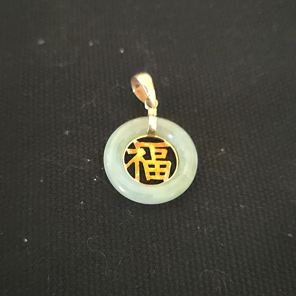 14k jade circle pendant the Fu symbol represents blessings.